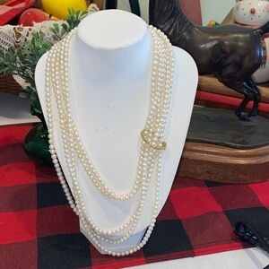 Vintage 49” single strand freshwater pearls. With gold over .925 silver clasp